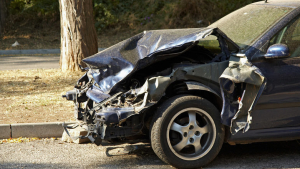 Black Car's Front End Damaged From Accident